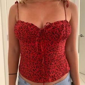 Realisation Par red and black top